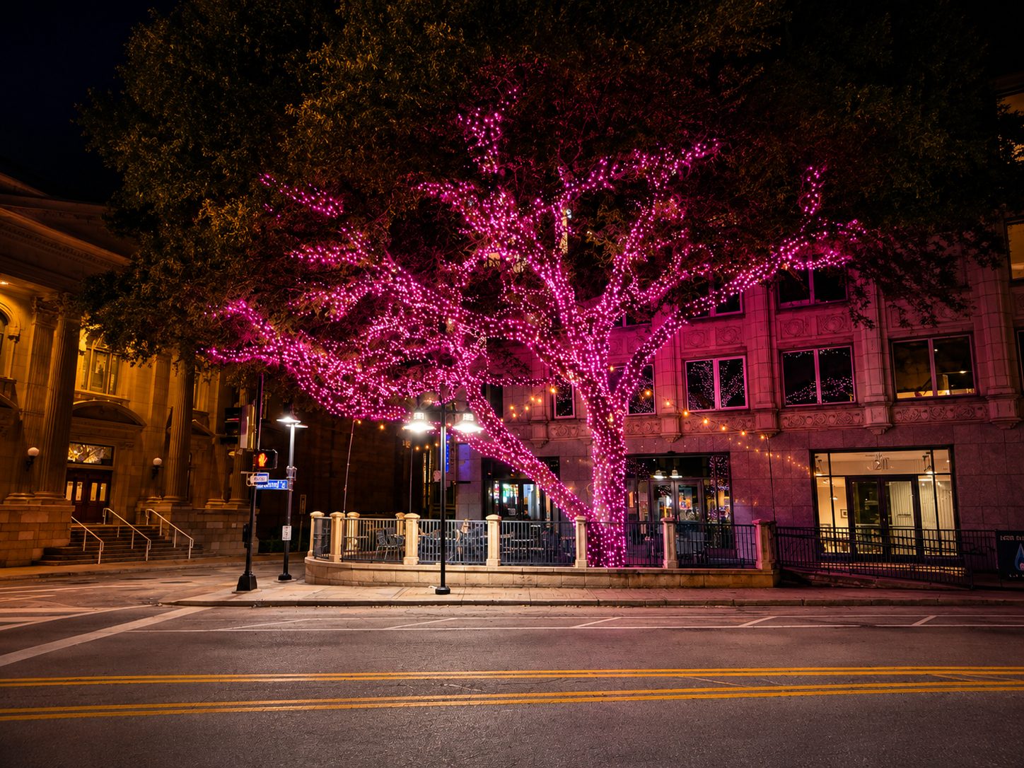 Commercial RGB Christmas lights in a cool color on a downtown tree